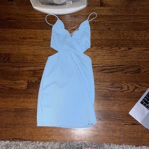 Tight fit dress, cross back, open sides